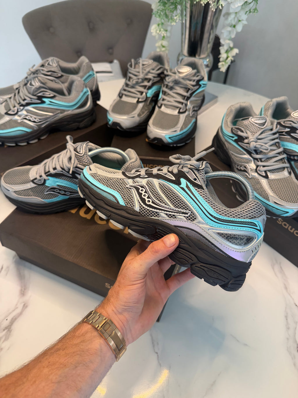 The Saucony ProGrid Omni 9 "Fossil / Splash" (Silver Teal Grey)